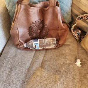 Round leather Hobo Bag.